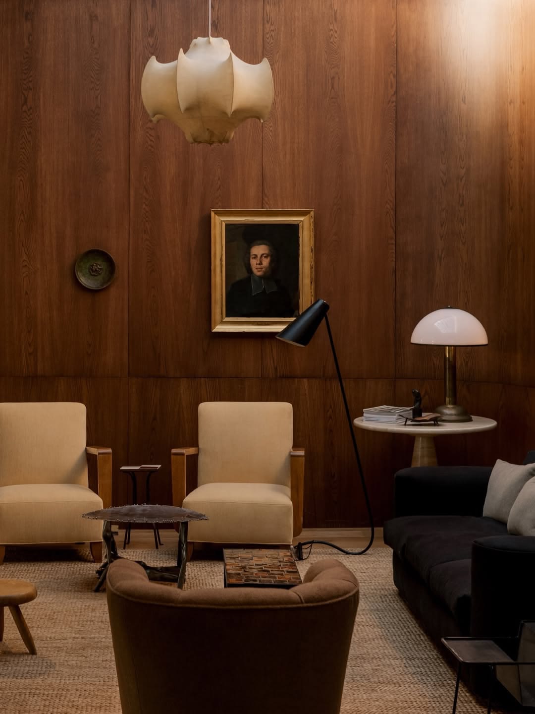 Roma Table Lamp in a warm wood-panelled room.